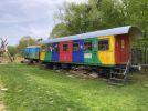 Personenwaggon mit Tischen und Sessel